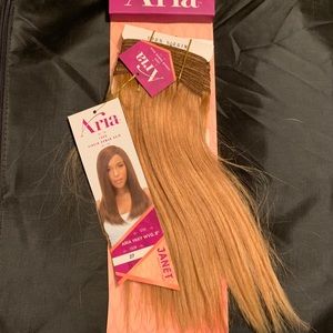 Sew in hair extensions.gold blonde 8’